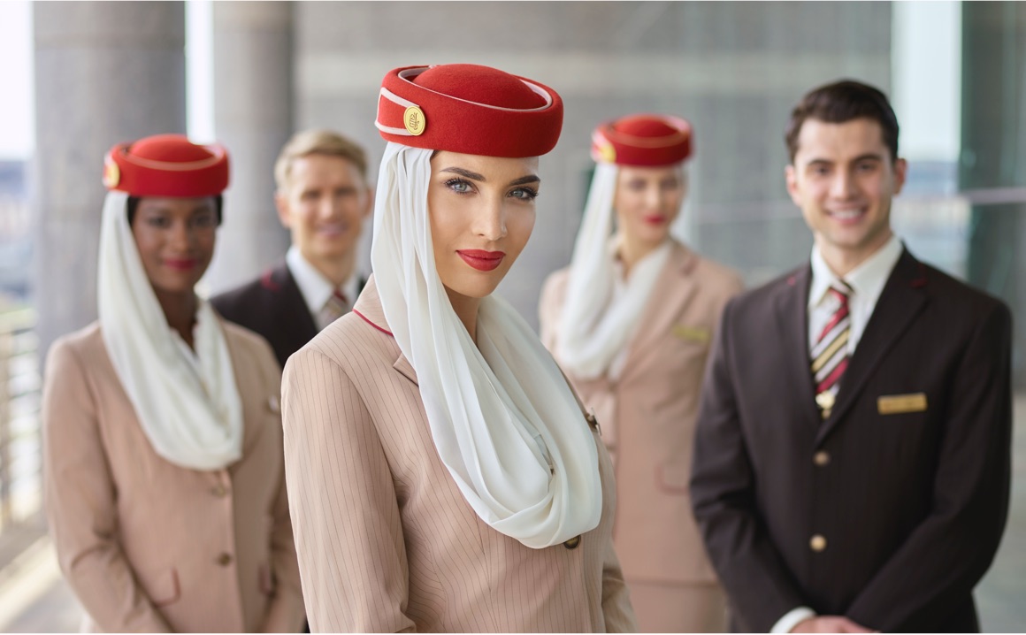 Emirates flight crew in uniform.
